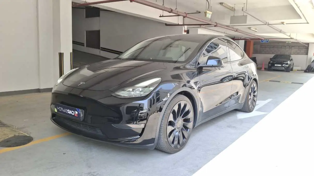 Tesla Model Y 2024 — photo 1
