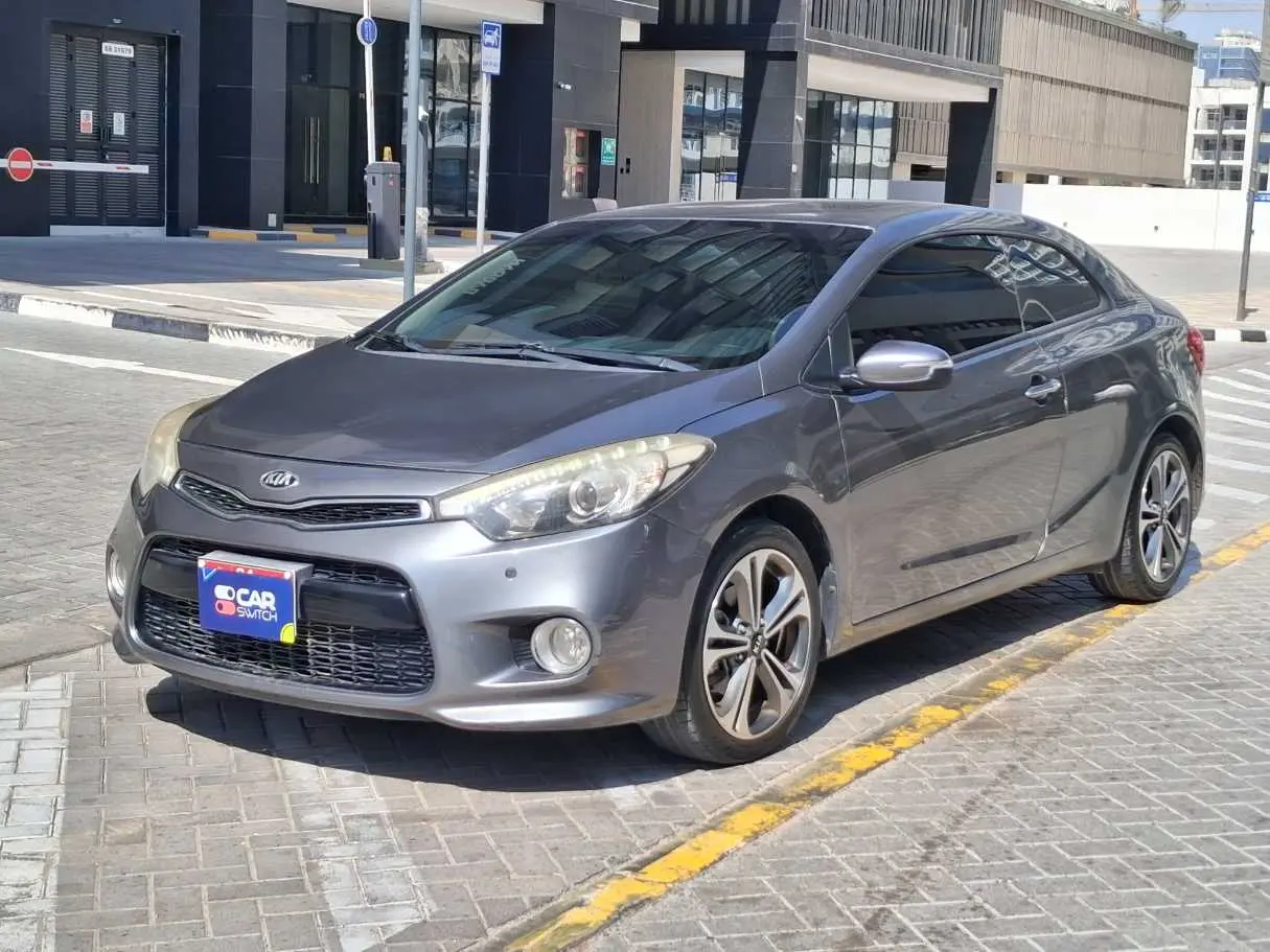Kia Cerato 2015 — photo 1